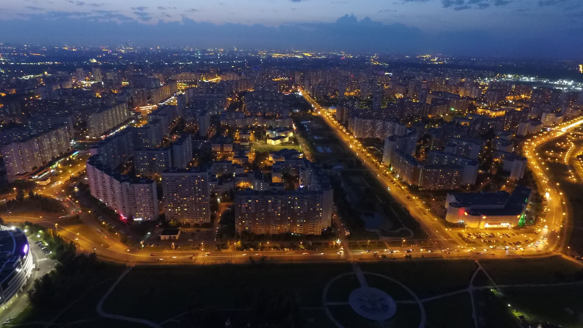 Panel housing districts with lit windows at night, Maryino, Moscow, 2017. Photo: Artem Svetlov
