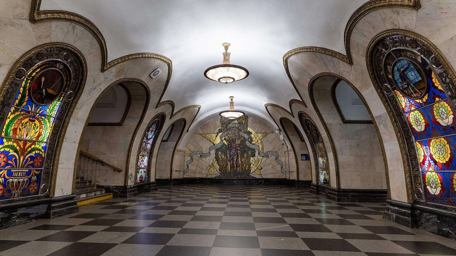 Novoslobodskaya hall with illuminated stained-glass panels